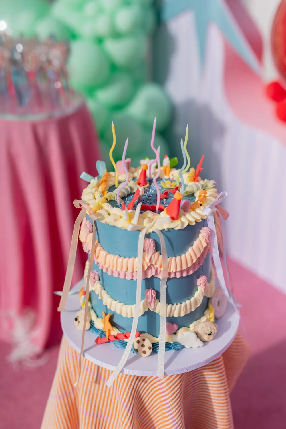 Carnival themed birthday cake with bright candy details